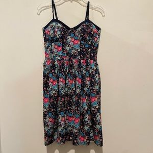 Sundress with cups, adjustable straps, and pockets